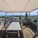 höhenverstellbares Glas- und Windschutzgeländer von SlideGlass®